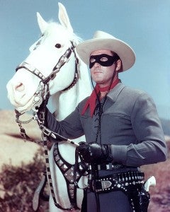 Clayton Moore stands with Silver in a publicity photo for the “Lone Ranger.” – Provided