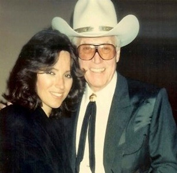 Clayton Moore stands with his daughter, Dawn, when he was inducted into the National Cowboy Hall of Fame in 1990. 