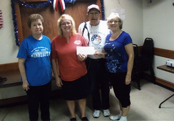 The Eagles Club donated to the Humane Society recently. Taco committee members Marlyss Johnson, Linda Eggleston and Gary Iverson made the presentation to director Christa DeBoer. — Provided