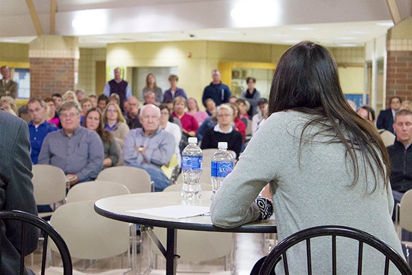 School board president Linda Laurie talks to a group of about 80 community members who came to the second public forum on the proposed calendar.  – Hannah Dillon/Albert Lea Tribune