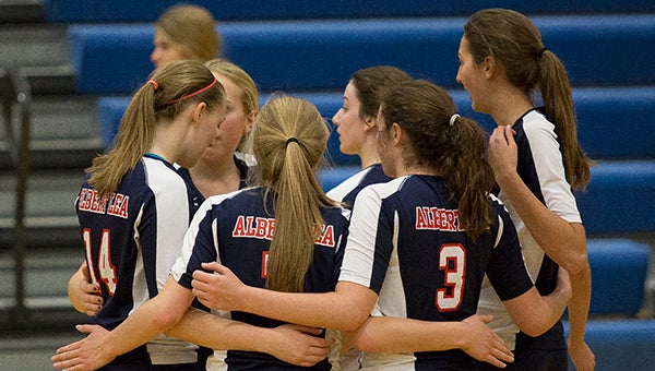 The Albert Lea Tigers huddle for the last time this season after losing to Hastings 3-0 Wednesday during the Section 1AAA girls volleyball tournament at Hastings High School. — Colleen Harrison/Albert Lea Tribune