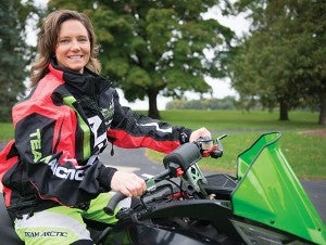 Jolene Bute sports her Team Arctic gear.  The team comprises snowmobile racers for Minnesota-based  Arctic Cat.