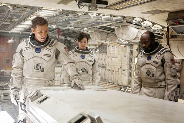 Matthew McConaughey, left, Anne Hathaway, center, and David Gyasi wear space suits that Albert Lea High School graduate Stacia Lang helped to build. – Provided