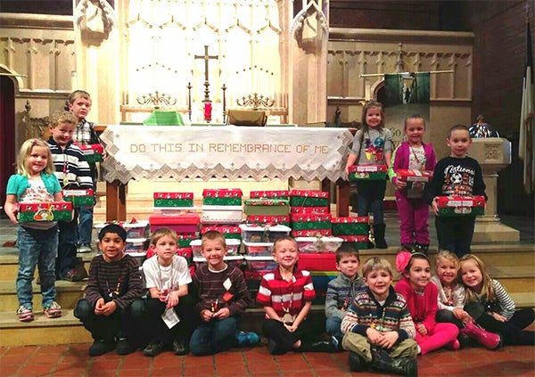 The Kindergarten Sunday school class from First Lutheran Church donated to Operation Christmas Child. These 5-year-olds had fun filling six shoe boxes with toys, art supplies and Christmas coloring books to send “far across the sea” to needy children who otherwise would not receive a Christmas gift. The shoebox gifts will ship out Monday from First Lutheran Church. — Provided
