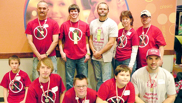 Members of the Unified Tigers participated on Nov. 16 in the state Special Olympics bowling tournament. Front row from left are Joshua Horejsi, Cody Olson, Kellen Kaasa, Bryson Buchanan and Luke Buchanan. Back row from left are Paul Horejsi, Taylor Shaft, Steve Olson, Lori Nelson, Trent Nelson. Special Olympics Unified Sports combine athletes with and without disabilities on the same team. By participating together, athletes and Unified Partners can improve their physical fitness, sharpen their skills, challenge the competition and overcome prejudices about intellectual disabilities. Through the Unified Sports program, families can play together. The Special Olympics Minnesota website is www.somn.org. — Provided