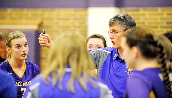 Lake Mills coach Jim Boehmer talks to his team during a timeout on Oct. 28 in the Class 2A Region 5 quarterfinals against West Fork. Lake Mills won the match 3-0. — Micah Bader/Albert Lea Tribune