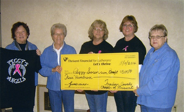Freeborn County Thrivent board members Sonja Honstad, Nancy Verhey and Virginia Boettcher present a check for $500 in supplemental funding from Thrivent Financial to Cheryl Boverhuis and Joni Groth for the Peggy Sorenson cancer benefit fundraiser held Oct. 18. — Provided