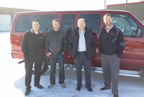 Dave Syverson’s donated a 12-passenger van to Youth for Christ’s The Rock on Nov. 14. From left are Tim Mann, Robert Modderman, Greg Gudal and Kade Vershey. — Provided