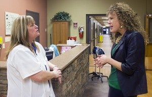 Good Samaritan Administrator Katie Davis talks with health unit clerk Wanda Baghley on Friday. – Sarah Stultz/Albert Lea Tribune