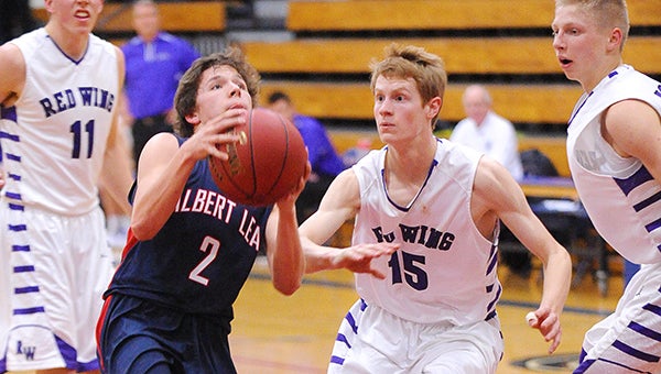 Kole Smith of Albert Lea drives to the basket Tuesday at home against Red Wing. — Micah Bader/Albert Lea Tribune