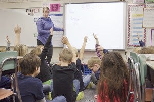 Anna Nordlocken, a third-grade teacher at Lakeview Elementary, teaches her students a math problem on Wednesday morning. According to the Pathways to Success, 80 percent of these third-graders should be on target for reading and math proficiency to fulfill the aim. – Hannah Dillon/Albert Lea Tribune