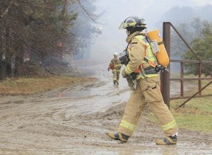 Firefighters respond to a hog barn fire at 85295 290th Street in rural Freeborn County Monday afternoon. — Jason Schoonover/Albert Lea Tribune