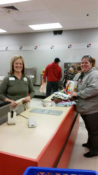 The Albert Lea Lions Club donated 24 gifts for teens and babies to the Salvation Army’s Angel Tree Project. Pictured is Lion Tammy Krowiorz purchasing some of those gifts at Shopko in Albert Lea. – Provided