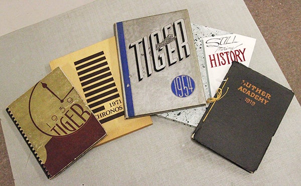 Yearbooks of the past are available for purchase at the Freeborn County Historical Museum. From left are a 1939 Tiger from Albert Lea High School, a 1971 Chronos from Lea College, a 1954 Tiger, a 1989 Tiger and a 1919 yearbook from Luther Academy, a Norwegian Lutheran Synod high school that closed in 1928. The museum also sells yearbooks from Alden-Conger and Glenville-Emmons schools. – Tim Engstrom/Albert Lea Tribune