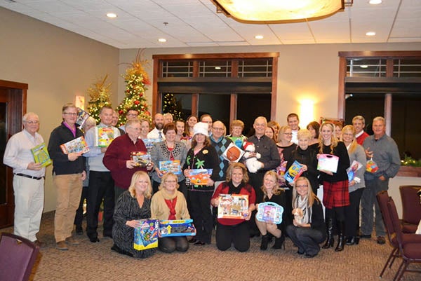 The Southeast Minnesota Association of Realtors and Affiliates donated toys to the Salvation Army tree Dec. 10. – Provided