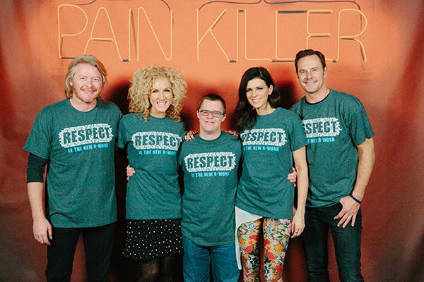Kellen Kaasa, pictured in the center, presented his friends from the band Little Big Town the new R-Word shirts from Special Olympics Minnesota at the band’s Rochester concert. Kaasa will be at Northbridge Mall from 10 a.m. to noon Saturday selling the shirts.  – Provided