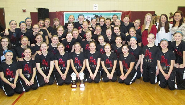 The Albert Lea dance team poses with its third-place trophy out of eight teams in the high kick competition Saturday at the Lakeville South Invitational. The Tigers JV team also won a third-place trophy out of eight teams in their first Class AA high kick competition of the season. Varsity captains are Angie Schmitt, Katelyn Hendrickson and Samantha Nielsen. Coaches are Kelsey Routh, Megan Kromminga and Jennifer Anderson. Next, the Albert Lea Dance Team will compete at 5:30 p.m. Saturday at the Big Nine Conference Tournament at Rochester Mayo. — Provided