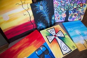 Andersen enjoys painting on canvas, and has done some painting during her hospital stays. One of her paintings will be part of a silent auction Saturday during her benefit. - Colleen Harrison/Albert Lea Tribune