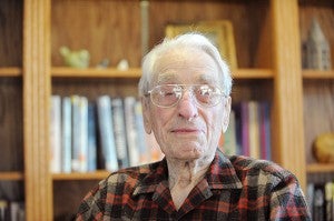 LeRoy Maas, a former teacher and wrestling coach at Albert Lea High School, in February sits in one of his favorite spots on the Good Samaritan Society premises, the library. – Micah Bader/Albert Lea Tribune