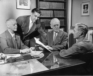 This photo was taken in 1947 for the Minneapolis Morning Tribune in 1947 when Ralph Peterson became a member of an Albert Lea law firm. From left are Bennett Knudson, Peterson, Judge John F.D. Meighen and William P Sturtz. - Provided