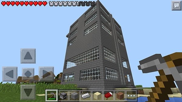 This is a skyscraper Tim Engstrom and his 7-year-old son, Forrest, made on a version of "Minecraft" for cellphones and e-tablets called "Pocket Edition." Inside is an elevator, an art gallery, hotel, lobby, workplace offices, rail station and a luxury suite.