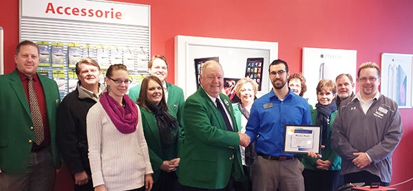 Albert Lea-Freeborn County Chamber of Commerce Ambassadors welcome new Wireless World manager Ryan Schwab to the chamber. - Provided