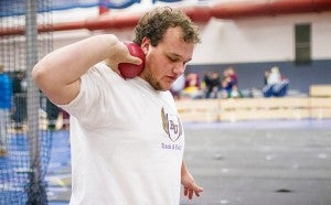 Bryce DeBoer of Bethel University’s track and field team prepares to throw the shot put this season. DeBoer took third place in the event Jan. 23 at the St. Thomas Invitational at St. Paul. — Bethel University Media Relations
