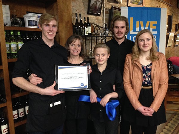 The Interchange Wine & Coffee Bistro has been designated as the first Blue Zones restaurant in Albert Lea. Pictured is part of the Hanson family, who own the restaurant. — Crystal Miller/Albert Lea Tribune