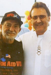 Charnecki with Willie Nelson. - Provided