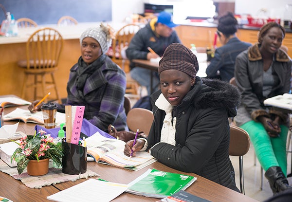 Adult Basic Education students answer questions Wednesday during an advanced English class at Brookside Education Center. - Colleen Harrison/Albert Lea Tribune