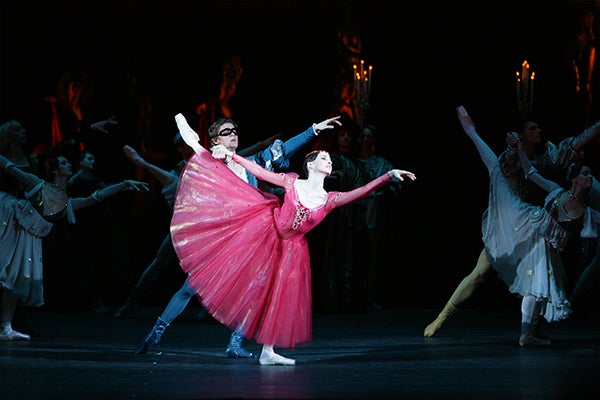 Anna Nikulina plays the part of Juliet and Alexander Volchkov plays the part of Romeo in the Bolshoi Ballet’s production of “Romeo and Juliet.”