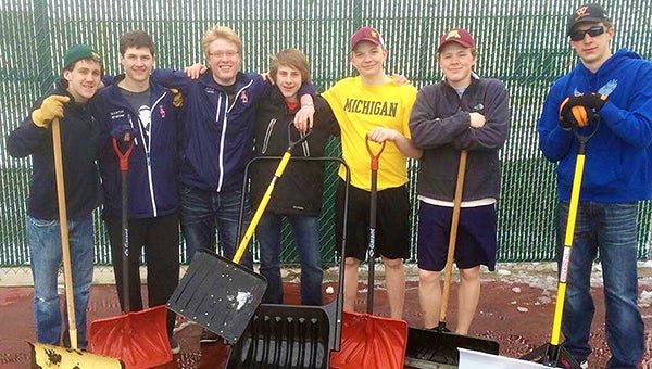 Members of the Albert Lea boys’ tennis team prepared the courts Wednesday for the spring season. From left are Matt Carlson, Will Martin, Garrett Matz, Nikk Christianson, Calvin Petersen, Calen Hoelscher and Matt Sager. The Tigers’ season starts at 4:30 p.m. Thursday at Mankato East. Albert Lea’s home opener will be against Red Wing at 4:30 p.m. April 7. — Provided