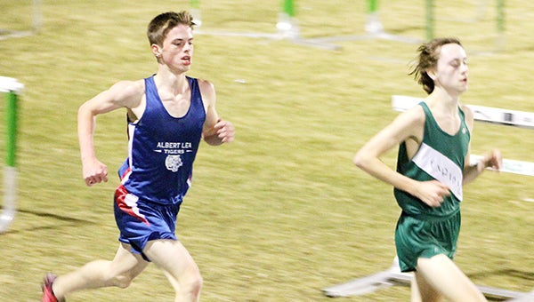 Caleb Troe of Albert Lea runs the 3,200-meter dash Tuesday at Faribault. Troe won the race with a time of 10.22.90. According to Albert Lea head coach Kevin Gentz, the host school encountered problems with its timing equipment and didn’t release official results. Albert Lea competed with seven other schools, but the team totals were not tabulated. The 3,200 run was one of three events the Tigers won. First- and second-place finishes — timed by Albert Lea’s coaching staff — are listed in the scoreboard. Lon Nelson/For the Albert Lea Tribune