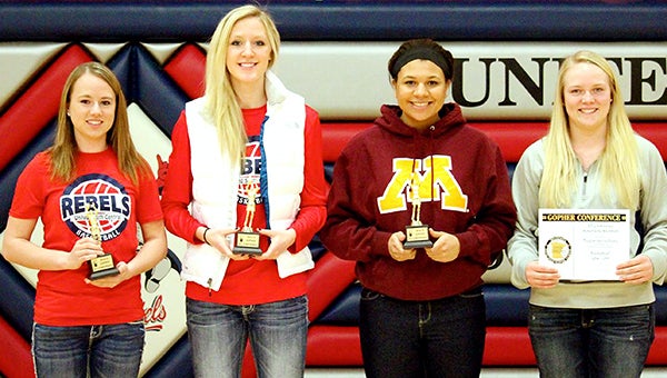 Four members of the United South Central girls’ basketball team were recognized by the Gopher Conference Sunday at the team’s awards banquet. From left are Taylor Schultz, All-Conference; Anissa Janzig, All-Conference; Shianne Robertson, All-Conference; and Taylor Steckelberg, All-Conference honorable mention. The Tribune recognized Janzig, Robertson and Schultz on its All-Area team published March 22. Janzig was a First Team All-Area selection after averaging 13.8 points and 9.6 rebounds per game. Robertson and Schultz were Second Team All-Area selections. Robertson averaged 12.4 points and 9.8 rebounds; Schultz averaged 10 points and led the team with 49 3-pointers. — Provided