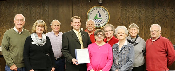 At the March 23 City Council meeting Mayor Vern Rasmussen honored local volunteers for Mayor’s Day of Recognition for National Service. In Albert Lea the Retired and Senior Volunteer Program of Senior Resources of Freeborn County falls under that category. Pictured are David Garbisch, Pat Garbisch, Cliff Rask, Rasmussen, Vern Teras, Jerri Fogel, Lois Ahern, Rose Olson, Beth Spande and Kyle Olson. - Provided