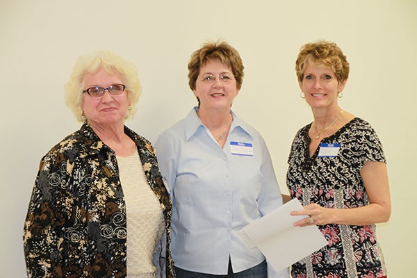 Donna Widenhoefer, left, and Joyce Purdy,center, of Albert Lea Art Center stand with Jillian Peterson, board chairwoman of the Freeborn County Communities Foundation. - Provided