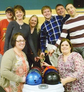 The Educators League produced three champions at Holiday Lanes. The team High Rollers won the roll-off. Team members were Matt Bliss, Cory Black and Steve Alford. Front row from left are Amanda Lester and Heather Johnson. Back row from left are Trent Nelson, Lori Nelson, Tina Pannkuk, Bliss, Black and Alford. — Provided