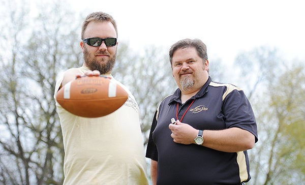 Albert Lea Grizzlies president Craig Schmidt, left, and coach Stephen Piper stand on the team’s practice field Saturday west of Lakeview Elementary School. - Micah Bader/Albert Lea Tribune