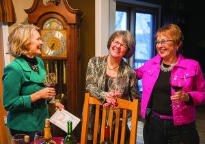 From left, Carol Larson, Becky Tennis Hanson and Jean Eaton share a laugh during one of their group’s monthly moais. The group got together and decorated their own wineglasses during one of their first meetings. - Colleen Harrison/Albert Lea Tribune