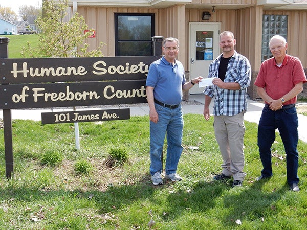 The Albert Lea Golden K1 Kiwanis Club made a donation to the Freeborn County Humane Society to help them match a Thrivent Action grant. Presenting the donation are Kiwanis members Tom Knudtson and Paul Larson. Receiving the donation on behalf of the Freeborn County Humane Society is Ryan Arbuckle. - Provided