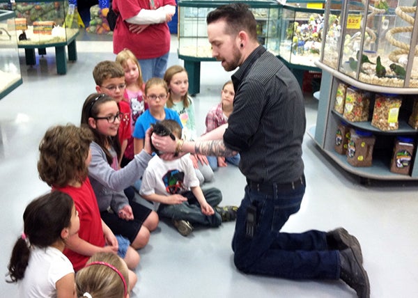 In order to learn more about the many different types of animals, birds and fish in the world, the kindergarten through third-grade students of St. Casimir’s School in Wells recently traveled to Pet Expo in Mankato. At the pet store, the students were greeted by a representative who introduced them to all the furry, scaly, flying and swimming pets. Touring the Aquatic Cove, the students became underwater dwellers as they gazed upon over 100 varieties of saltwater and freshwater fish, live rocks, coral and invertebrates. Rising to the skies, the representative shared with the students the many cockatiels, parakeets, finches and canaries that happily chirped, squeaked and whistled on command to the delight of the kids. Back on land, the children spent many happy minutes stroking the soft ears of bunnies and feeling the hard shell of a turtle that may live to be 150 years old. A few of the braver souls in the group enjoyed feeling the sleek, writhing skin of the snakes. - Provided
