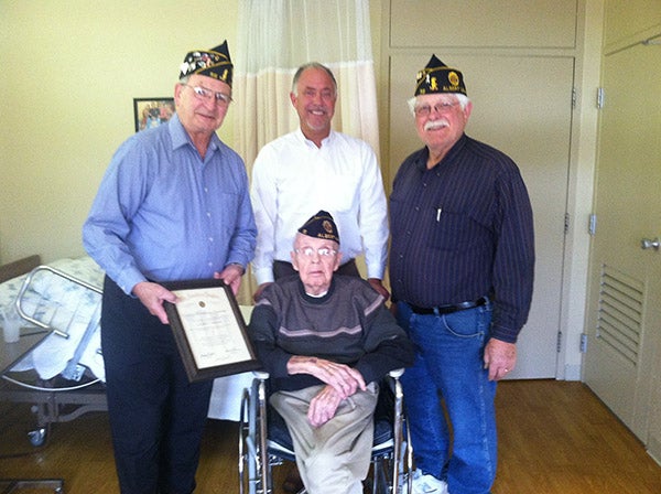 David Nelson joins his father Lauris “Lolly” Nelson as he receives a certificate of 70 years continuous membership with the American Legion. He has been a member for all those years at Leo Carey Post 56. Presenting the certificate are past commanders Dave Mullenbach and Arnie Mulso. - Provided