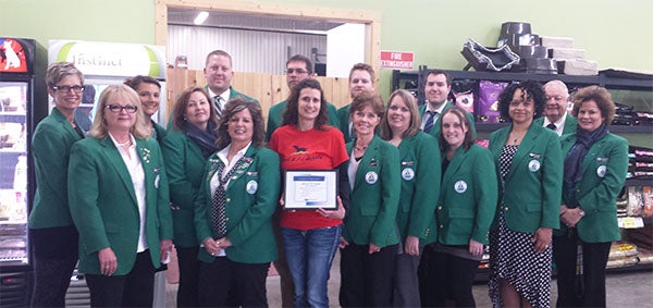 Ambassadors from the Albert Lea Chamber of Commerce congratulate Ranch and Pet Supply on its 10th anniversary. — Provided