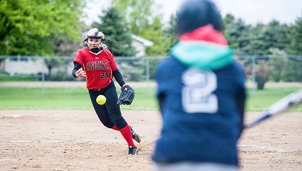 Jessica Price of Alden-Conger throw a pitch to Glenville-Emmons' Lani Poole Monday at Alden. — Micah Bader/Albert Lea Tribune