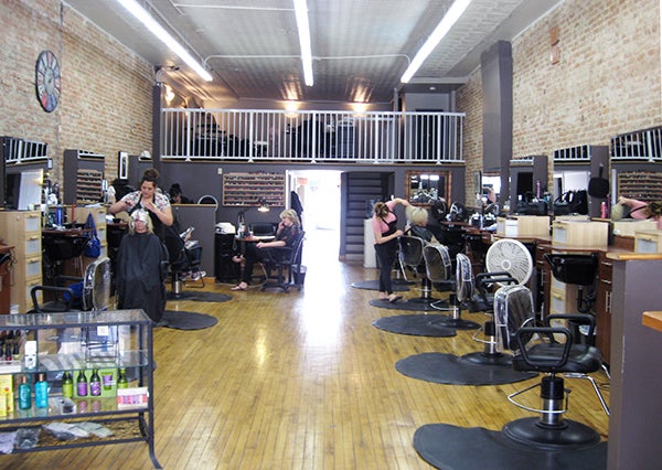 Stylists work last week in Expressions Salon & Spa on South Broadway. The salon offers everything from cuts, colors and extensions to pedicures, manicures and waxing, to name a few. - Renee Citsay/Albert Lea Tribune