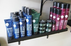Products sit on a shelf at Expressions Salon & Spa. - Renee Citsay/Albert Lea Tribune