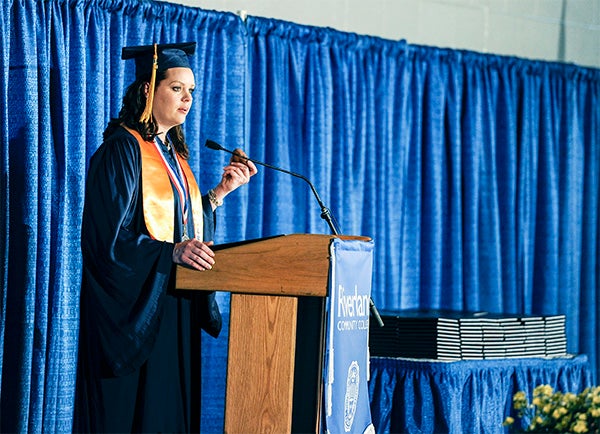 Heather Fast, of Mankato, gives her speech during Riverland Community College commencement Friday afternoon at Riverland. — Eric Johnson/Albert Lea Tribune