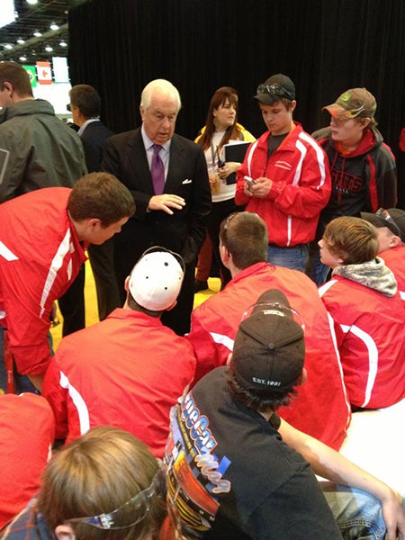 Students involved in the Alden-Conger supermileage team met Roger Penske at the Shell Eco-marathon in April in Detroit. -Provided