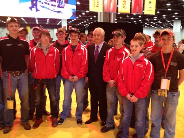 The Alden-Conger supermileage team poses with Roger Penske at the Shell Eco-maraton in April in Detroit. Penske invited the team to visit his shop and garage in North Carolina over the summer. - Provided