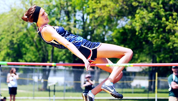 Sarah DeHaan of Albert Lea competes in the high jump Friday at the Big Nine Conference track meet at Mankato East. DeHaan was All-Conference in the event by taking second place with a leap of 5-2. The Tigers produced seven top-10 finishes and took 11th place with 39 points out of 12 teams. Adam Holt/Faribault Daily News